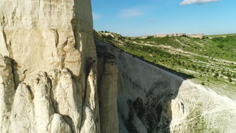 white cliff and valley landscape