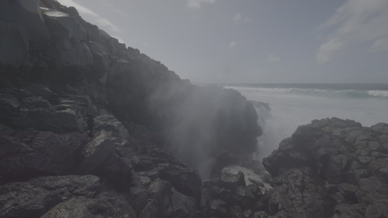 Volcanic Coastline with Blowhole and Powerful Waves