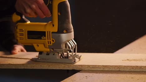 using a jigsaw to cut wood