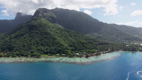 aerial view of moorea island island, french polynesia, volcanic hills and coastline with coral reefs
