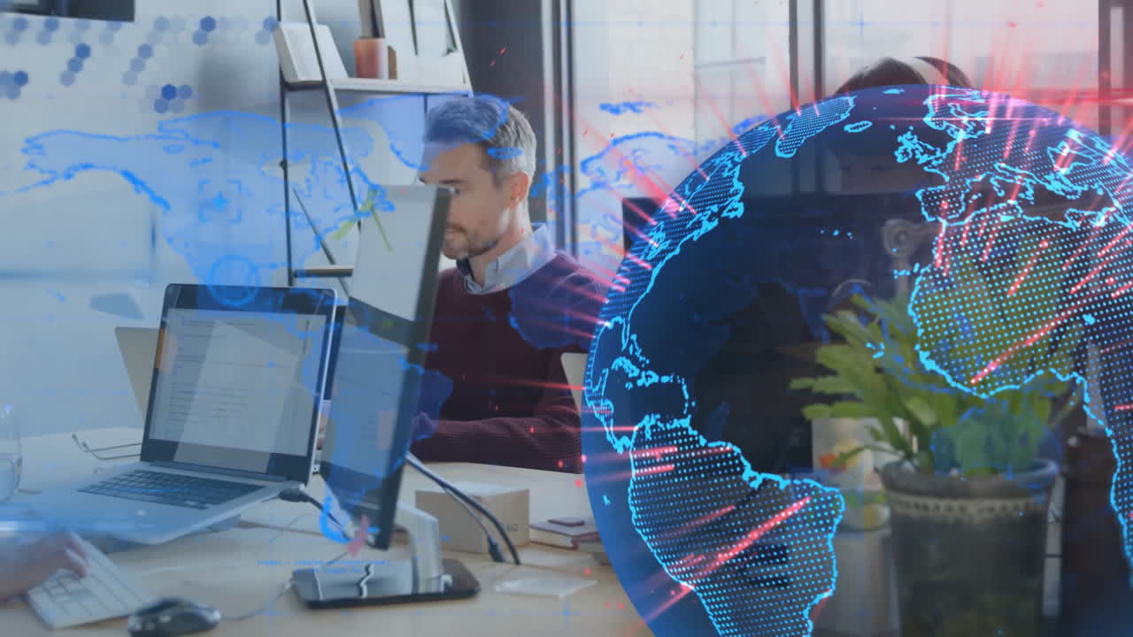 Businessman working at desk with digital world map overlay animation