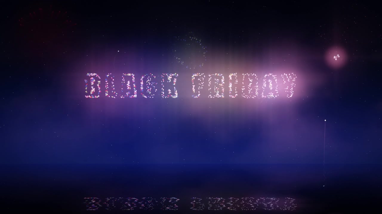 Vibranti fuochi d'artificio che formano la scritta Black Friday nel cielo notturno scuro sopra acqua calma, creando un annuncio festivo di una grande svendita