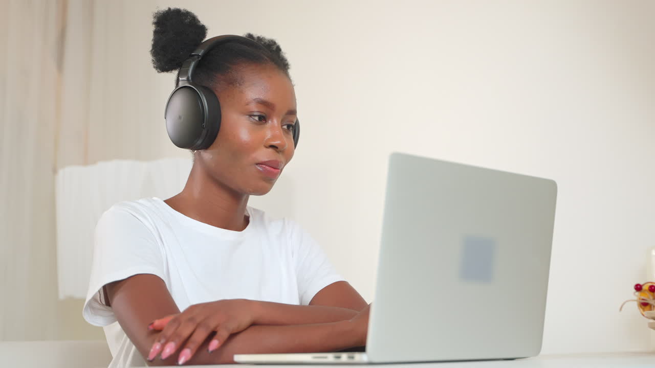 Woman having a video call on her laptop