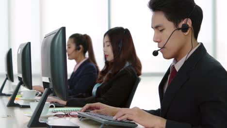 business people wearing headset working in office