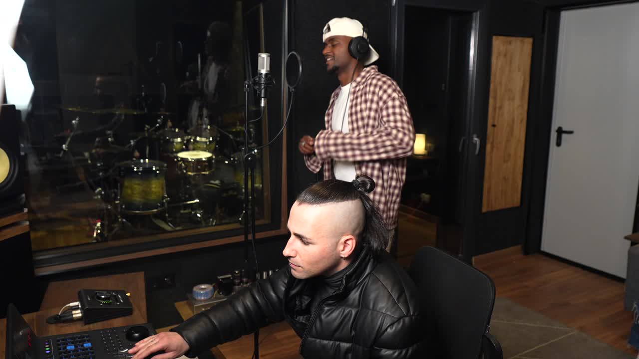 Musicians Recording in a Music Studio