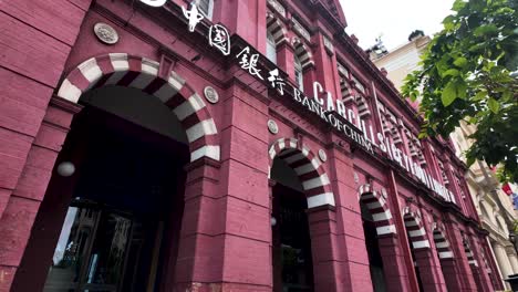 the cargills building, a landmark with a distinctive red facade, represents historic architecture in colombo, sri lanka, showcasing intricate architectural details and cultural significance.