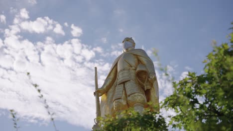 oda nobunaga standing over gifu holding rifle, historic feudal lord, japan