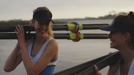 female rowing team training on a river