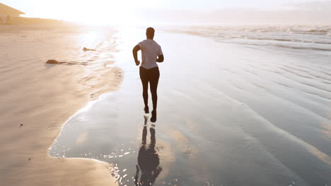 man, beach and running in fitness