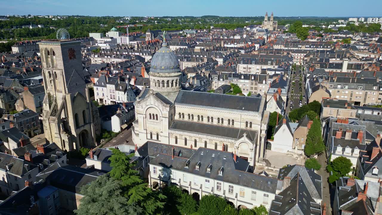 Basilica of St. Martin and Charlemagne Tower in Tours, France. Aerial backward