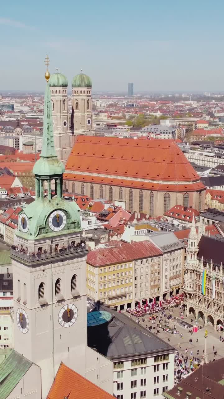 Frauenkirche Catholic Cathedral Seen From St. Peter Church At Marienplatz In Munich, Germany. - aerial vertical shot