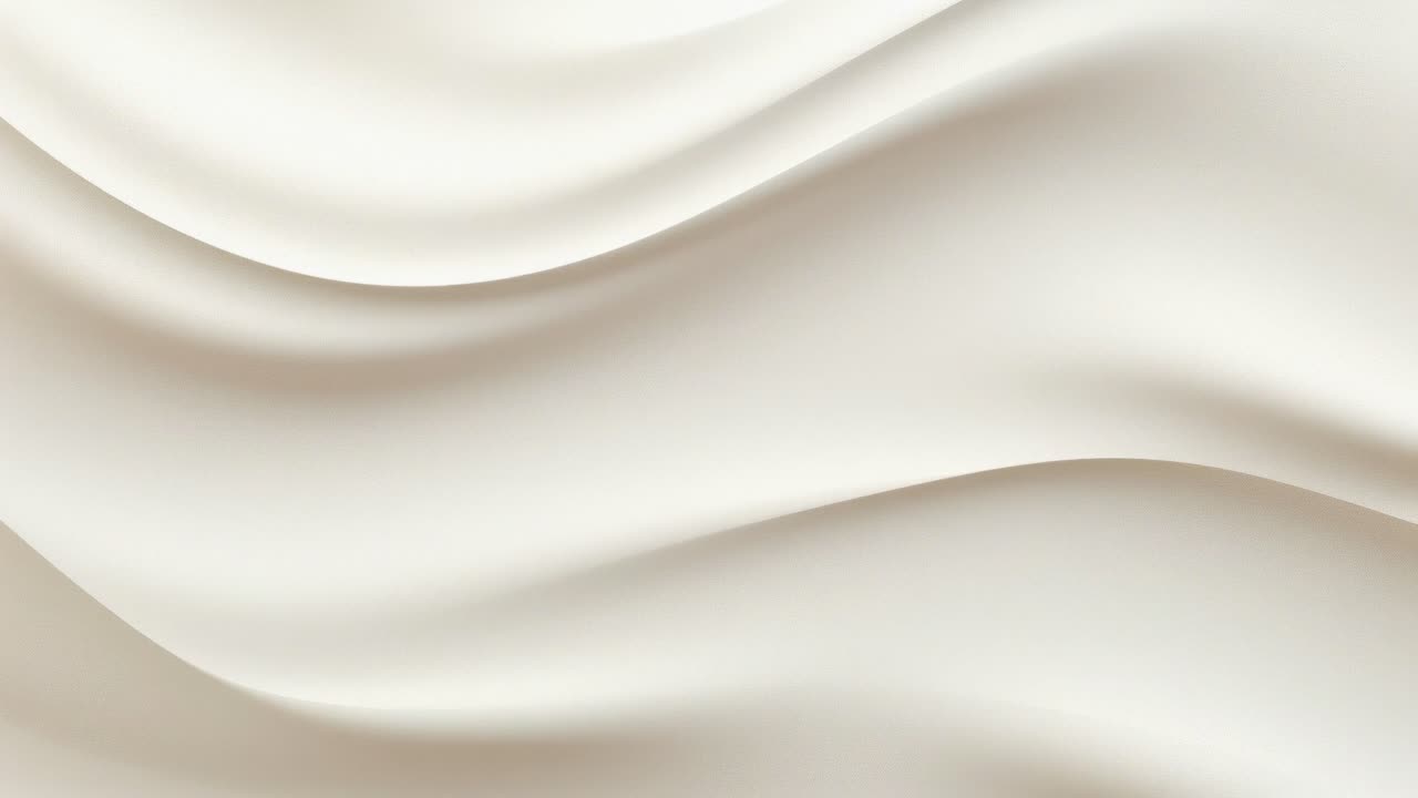Close-up video of silky, flowing fabric in soft beige tones, showcasing smooth textures and elegant