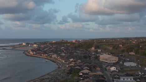 mikuriya in daisen town, aerial pullback shot of japan at sunset