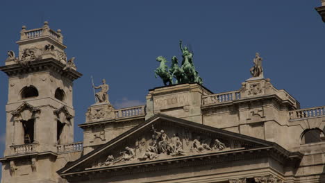 pan across justice palace budapest rooftop decorations, statues and towers