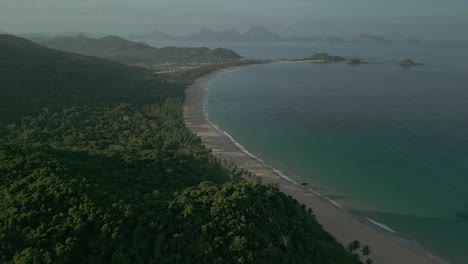 Forest,-beach,-sea-and-hilly-islands-in-Philippines,-forward-aerial