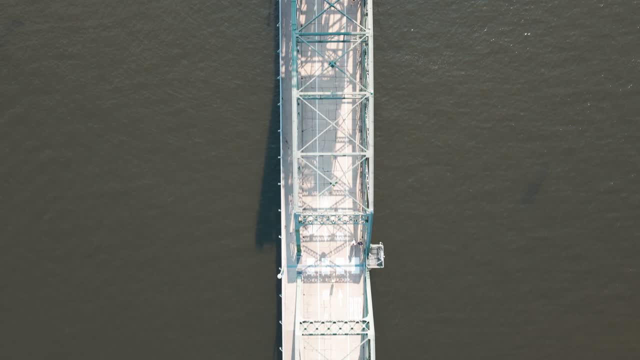Aerial bird's eye close-up shot flying over the pedestrian Stillwater Lift Bridge on the St. Croix River in Minnesota. 4K