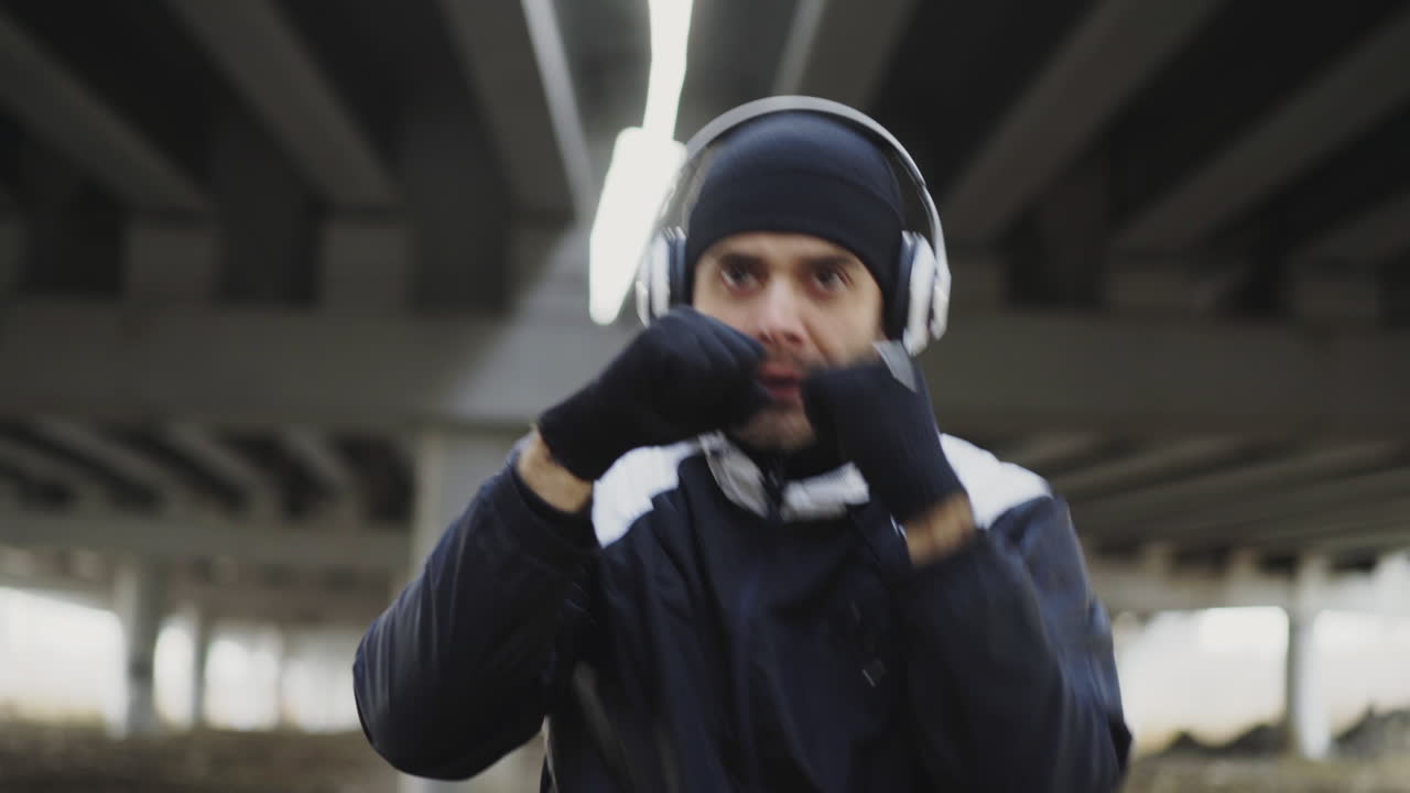 Man Boxing Workout Under an Overpass