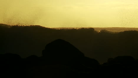 Large-waves-as-they-crest-and-break-in-slow-motion-at-sunset-2