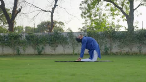 Indian-man-doing-Camel-Yoga-pose