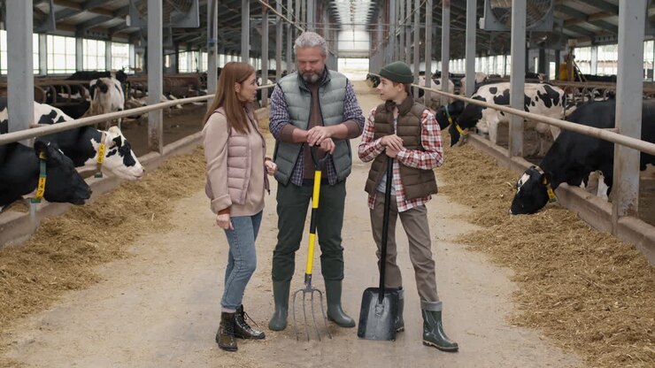 Family Talking inside Dairy Farm