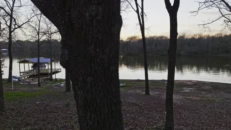 Panning-through-wooded-area-at-Quitman-Lake-in-Quitman,-Texas