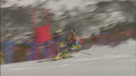 a skier navigates through a slalom course