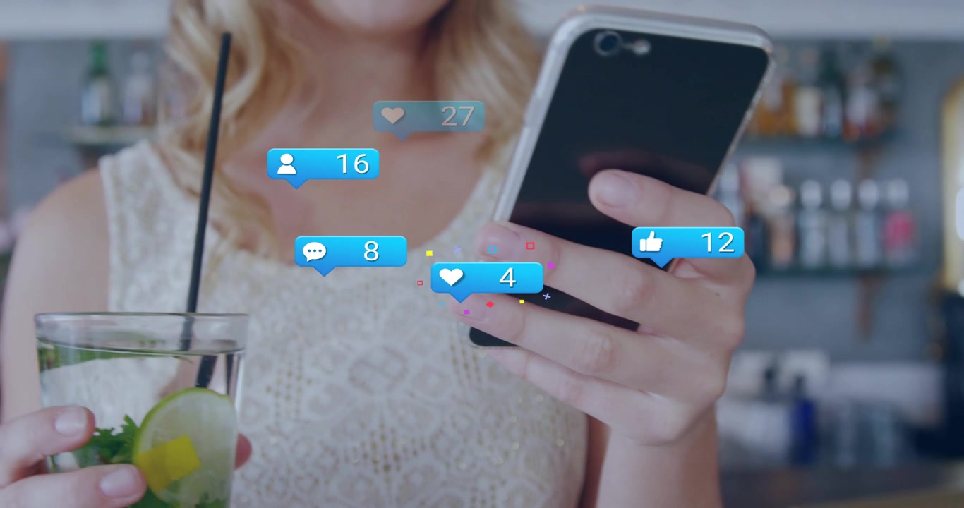 Woman tapping phone while raising drink, generating marketing icons and rising counters in bar