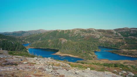 experience breathtaking scenery of unspoiled lakes by traveling from seterdjupna to malitjønna in indre fosen, trøndelag, norway - handheld shot