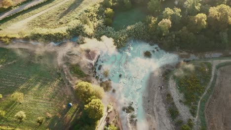 cascate del mulino, soothing natural hot springs bath, saturnia, tuscany, italy, europe, drone view fixed shot