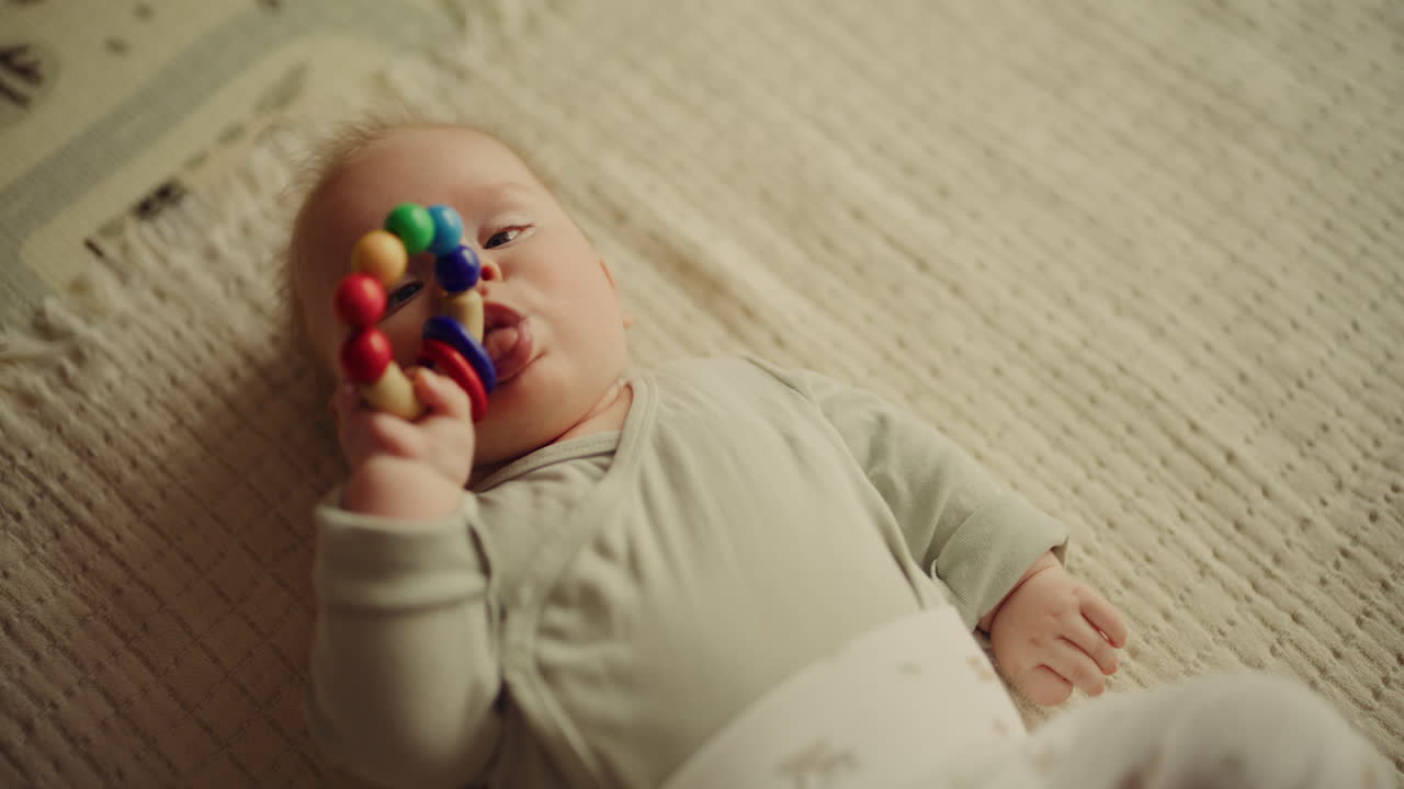 Baby Boy Playing with Wooden Toy