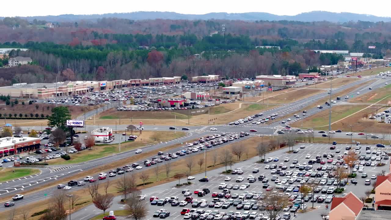 Georgia State Route 400 highway road surrounding North Georgia shopping malls, Dawsonville, Atlanta, Drone shot