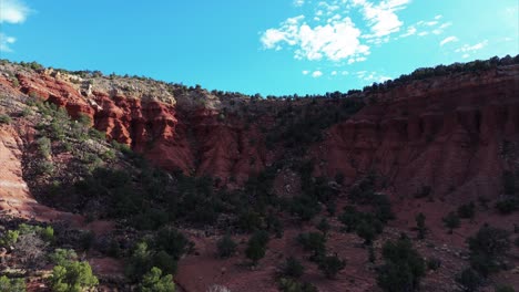 Capitol-Reef-Mountains-Against-Blue-Sky,-Aerial-View-Of-Utah-National-Park