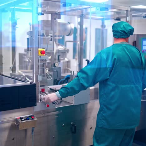 pharmaceutical worker operates pills