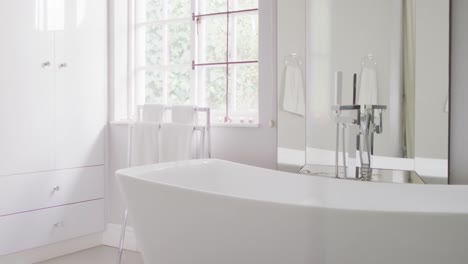 Video-of-bathtub-in-modern-white-fresh-bathroom