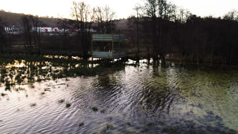 Overflowed-Bird-Watching-Tower-at-Stora-Vikens-Strandängar-Near-Gothenburg,-Sweden---Aerial-Shot