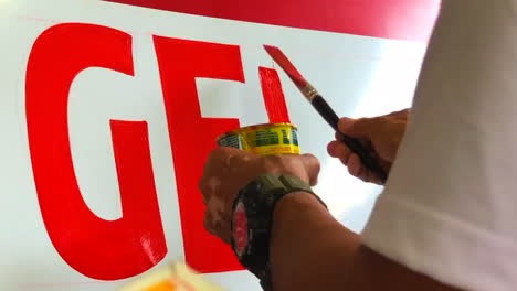 lapso de tiempo: carteles pintados a mano para las tiendas que venden e-load