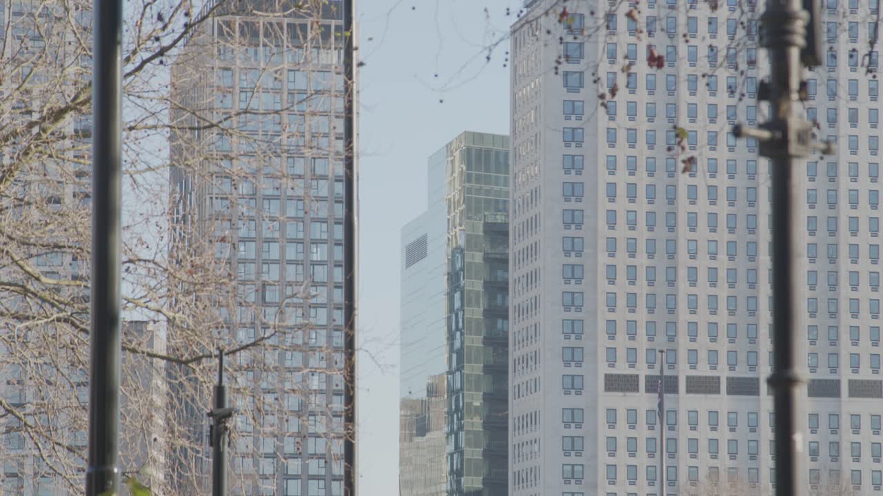 Tall skyscrapers rise in the heart of London.