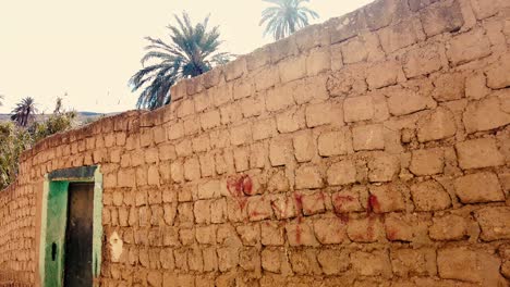 an old village in the middle of the desert with the style of arab house