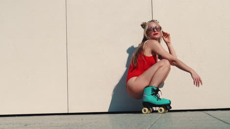 woman on roller skates in red swimsuit