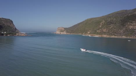 tracking aerial as power boat motors to knysna heads in south africa