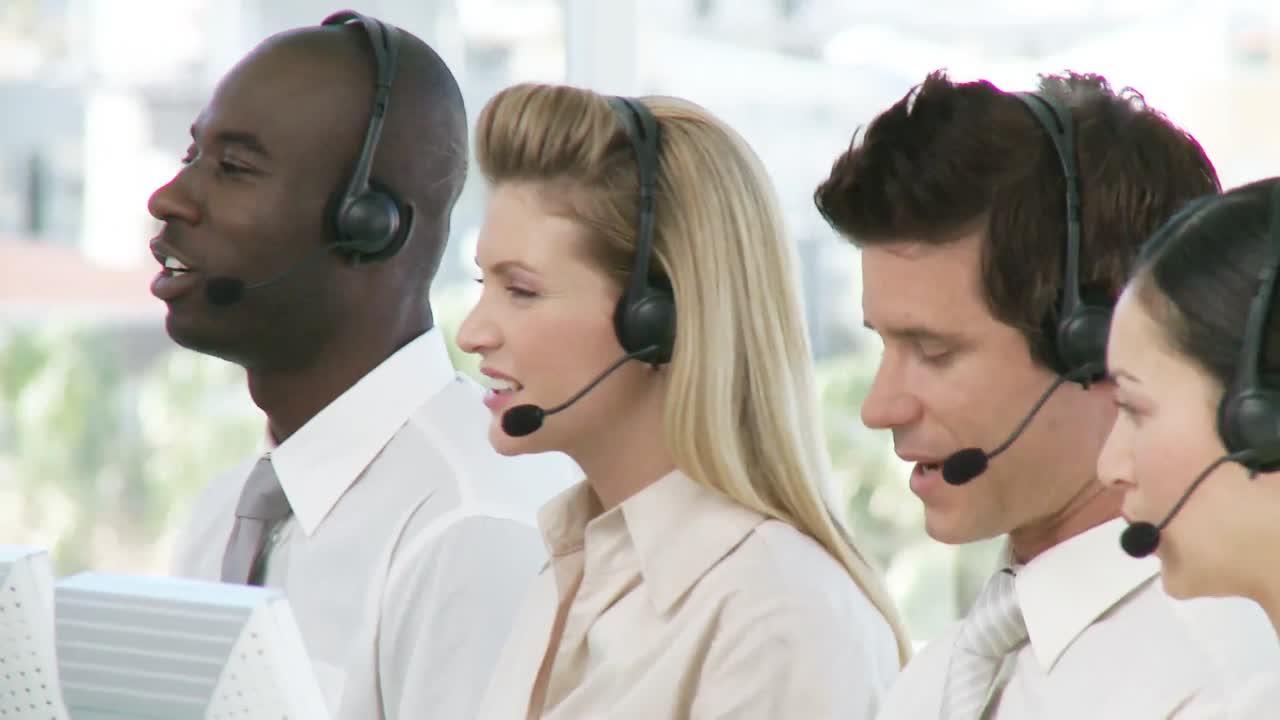 Team of people talkin on headsets