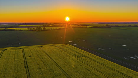 chasing sunset timelapse gold sun skyline aerial drone agriculture land countryside