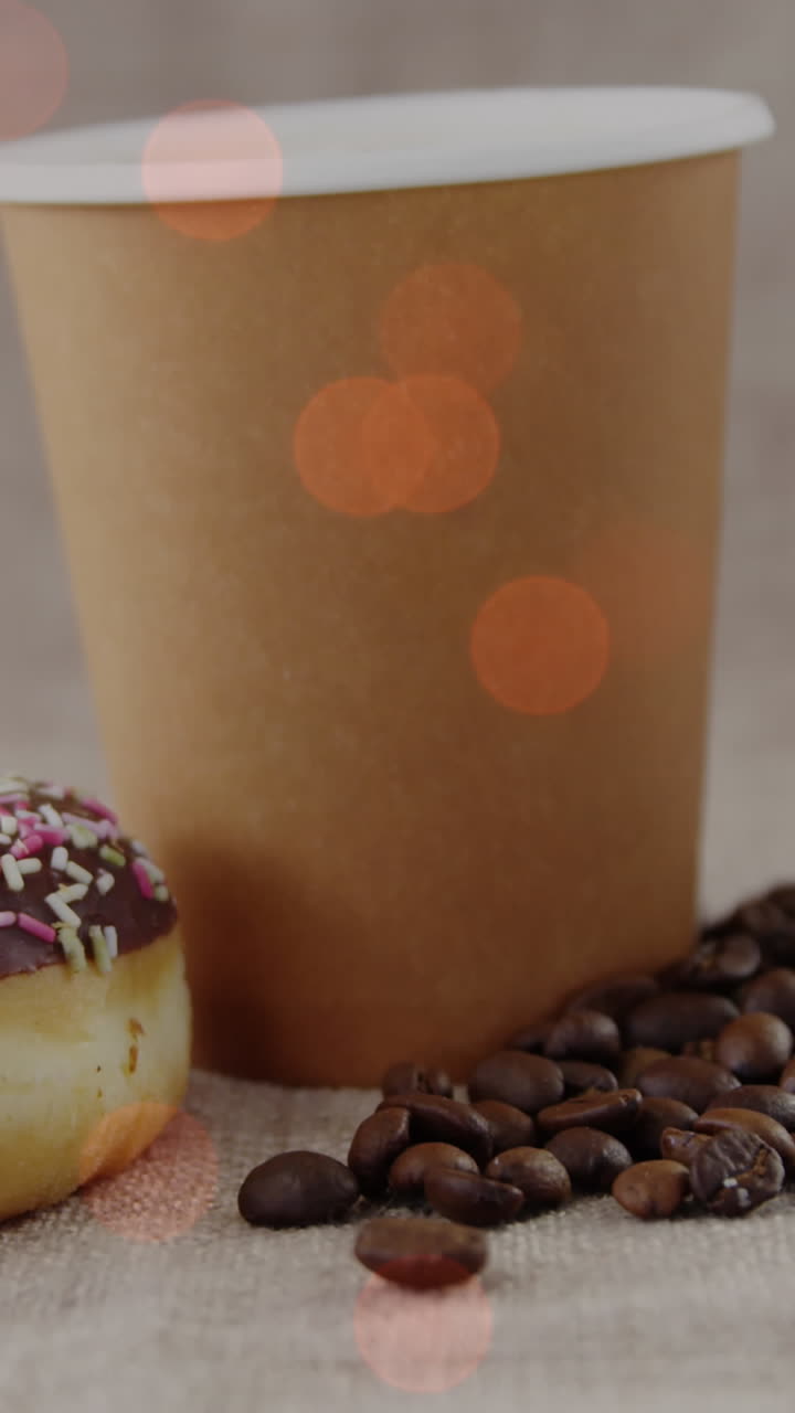animación de café y rosquilla sobre puntos de luz
