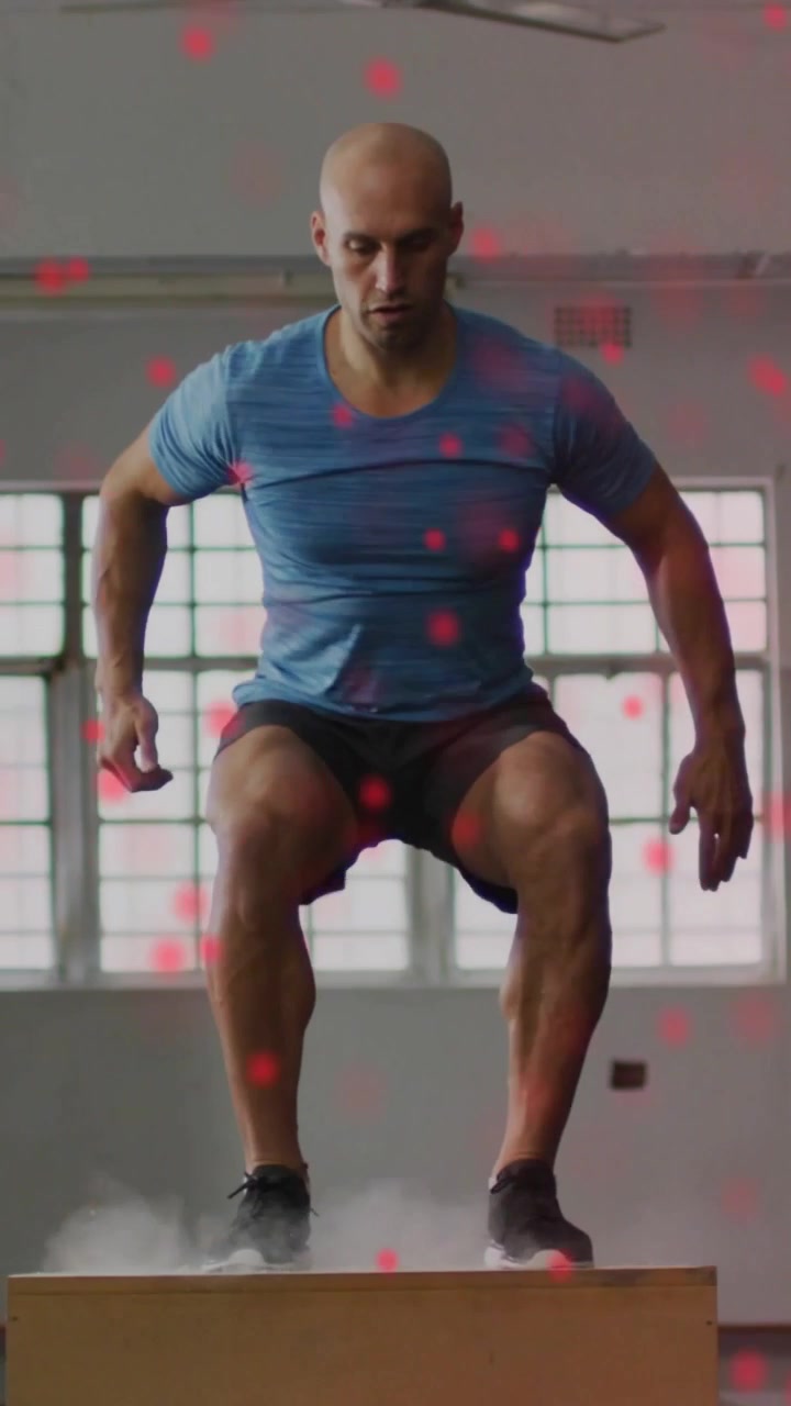 Video verticale: Uomo che appoggia le mani su una plyo box e salta, allenamento fitness con sovrapposizione di punti rossi.