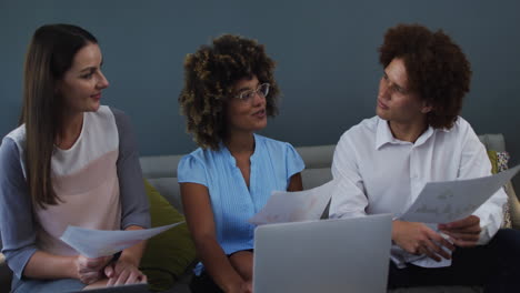 diverse business colleagues in discussion at a casual meeting in the office