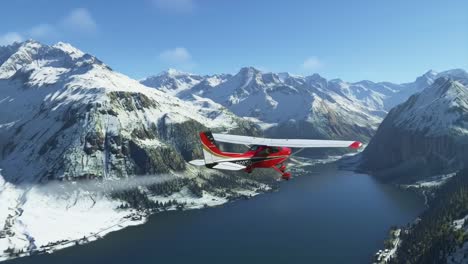 winter scenic aerial view of red and white single engine aircraft gliding over snow capped mountain range, alpine lake reflecting bright sunlight during peaceful flight
