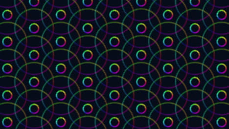 symmetrical pattern of overlapping circles on black background