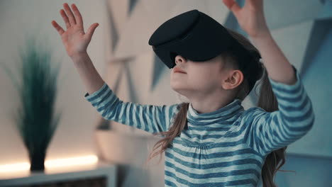 little girl with virtual reality glasses