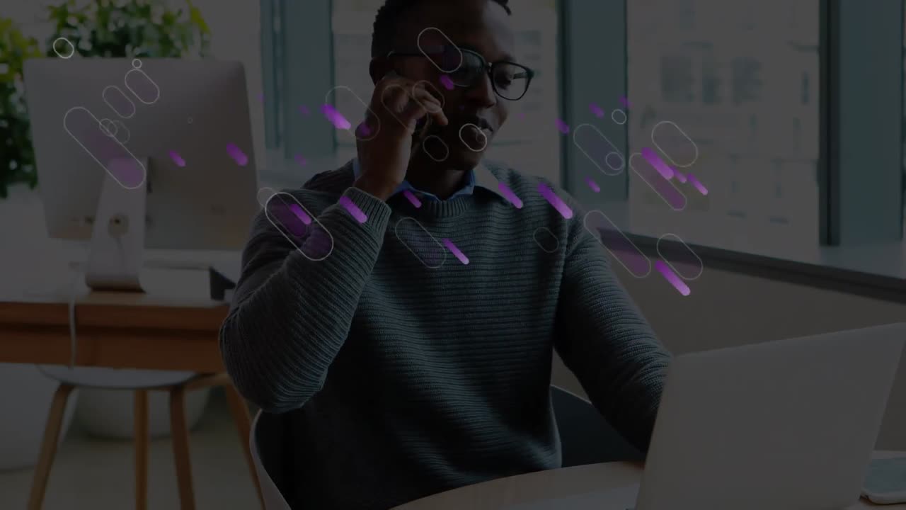 Animation of purple lights trails over businessman in office