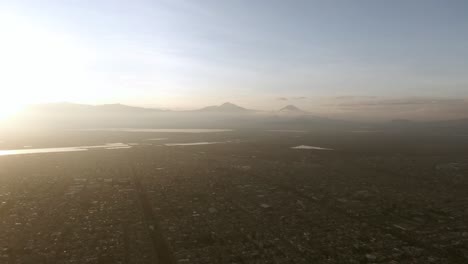 Sunrise-Over-Mexico-City,-Volcanoes-Popocatepelt-e-Iztlaccihuatl,-Lake-Texcoco,-Mexico-Tenochtitlan